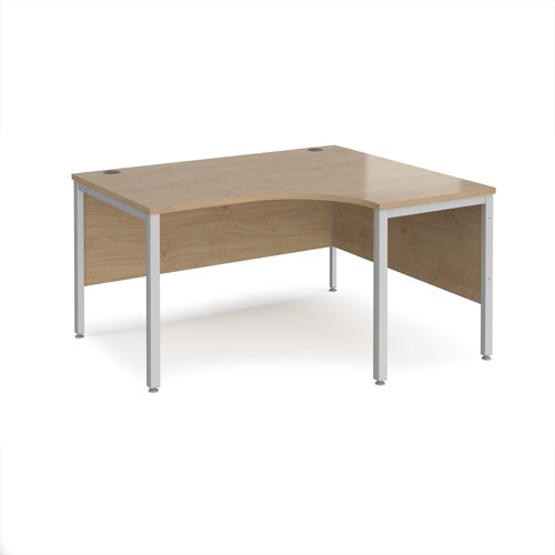 Maestro 25 right hand ergonomic desk 1400mm wide - silver bench leg frame, Kendal Oak top Maestro 25 right hand ergonomic desk 1400mm wide - silver bench leg frame, Kendal Oak top