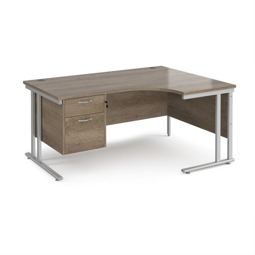 Maestro 25 right hand ergonomic desk 1600mm wide with 2 drawer pedestal - silver cantilever leg frame, Nebraska oak top Maestro 25 right hand ergonomic desk 1600mm wide with 2 drawer pedestal - silver cantilever leg frame, Nebraska oak top