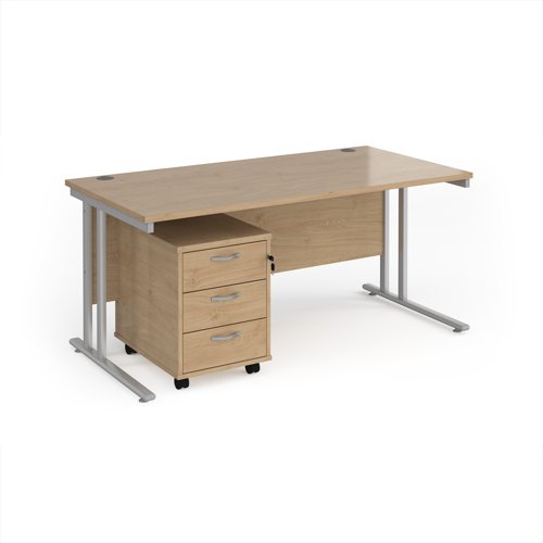 Maestro 25 straight desk 1600mm x 800mm with silver cantilever frame and 3 drawer pedestal - Kendal Oak Maestro 25 straight desk 1600mm x 800mm with silver cantilever frame and 3 drawer pedestal - Kendal Oak