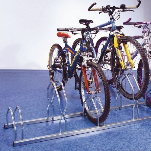 Staggered height floor / wall mounted cycle racks - zinc finish Staggered height floor / wall mounted cycle racks - zinc finish